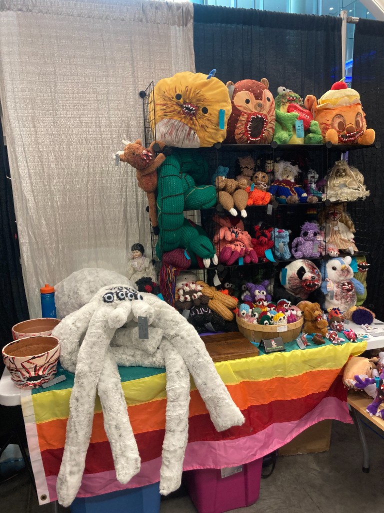 Creepy Peep booth with rainbow tablecloth